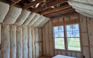 Fiberglass batt insulation in vaulted ceiling and walls. Fiberglass batt insulation in vaulted ceiling and walls.